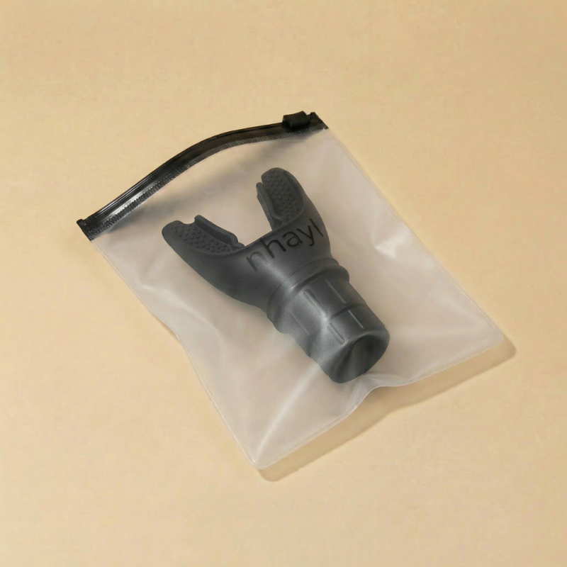 nhayl breathing trainer inside protective case, top-down view on beige background